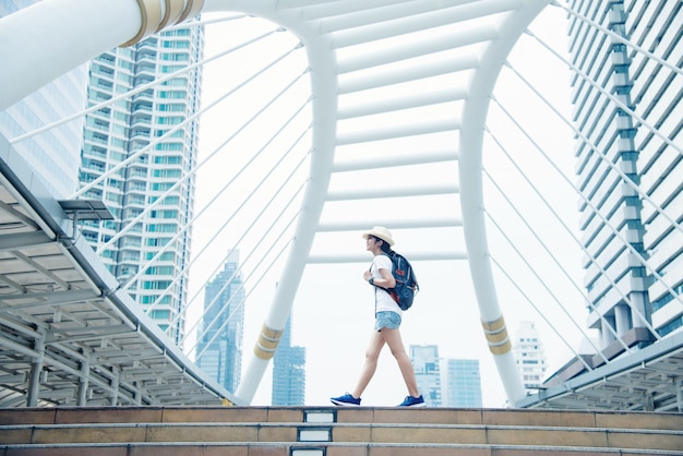 Happy Smiling Asian Student Girl with Backpack in City Background – Free Download