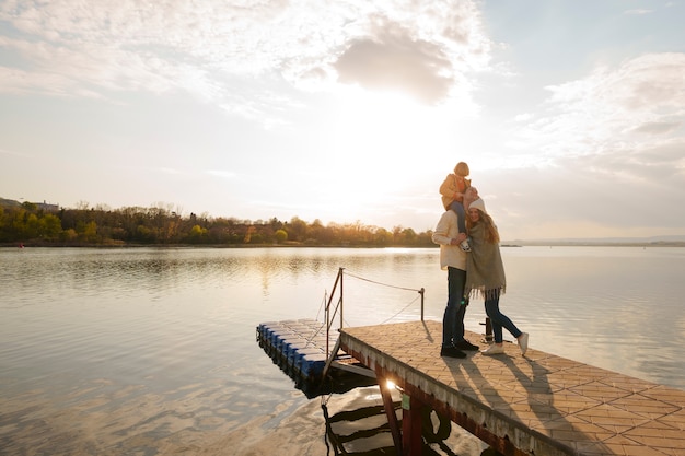 Family Enjoying Time on a Jetty – Free Stock Photo for Download