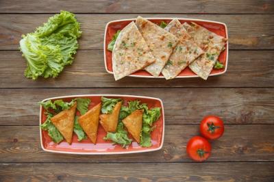 Delicious Flatbread Wraps: Gutab and Triangular Borek – Free Stock Photo | Download Free