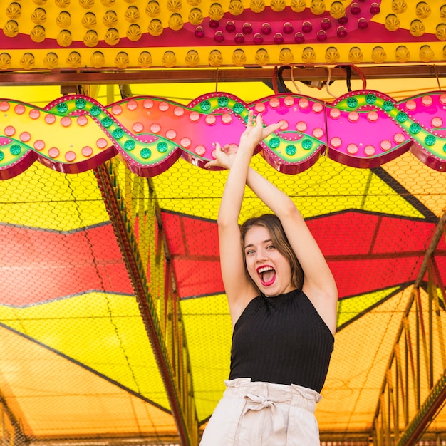 Joyful Young Woman Enjoying Amusement Park Fun – Free Stock Photo, Download Free