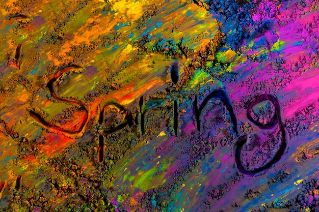 Top View of Handwritten Spring Text on Multicolored Holi Powder – Free Stock Photo for Download