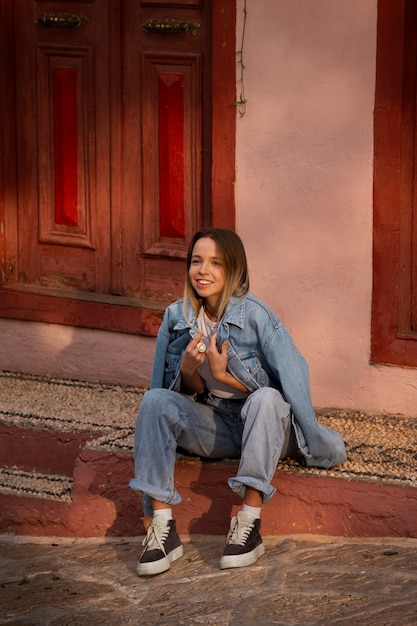 Woman in Complete Denim Outfit – Free Stock Photo for Download