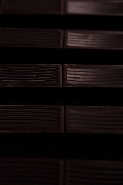 Close-up of Dark Chocolate Bar Tiles in a Line – Free Download