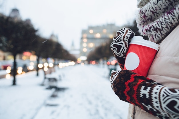 Evening Coffee: Woman in Long Sleeves Holding a Red Cup – Free Download