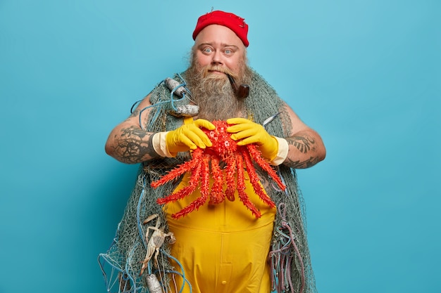 Bearded Fisherman Catches Large Octopus in Port – Free Stock Photo Download