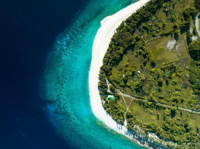 Aerial View of the Stunning Maldives Beach and Crystal Clear Sea – Free Download