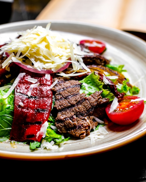 Grilled Meat with Vegetables and Lettuce on a Plate | Free Stock Photo for Download