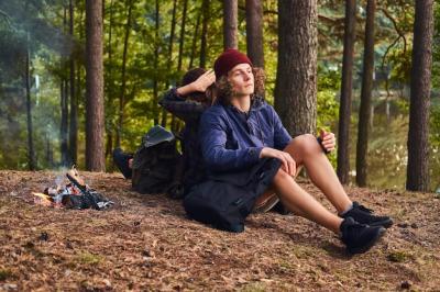 Young Hipster Couple Hiking in the Forest near a Campfire – Free Stock Photo for Download