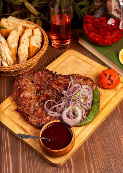 Beef Steak with BBQ Sauce, Onion Salad, Grilled Peppers, and Tomatoes – Free Download