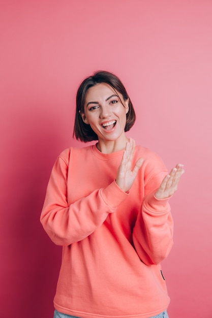 Casual Sweater-clad Woman Clapping and Celebrating Joyfully – Free Download