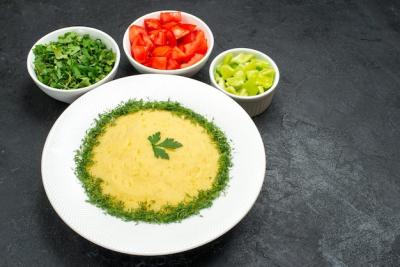 Delicious Top View of Mashed Potatoes with Greens and Sliced Tomatoes – Free Download