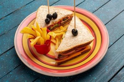 Delicious Sandwiches with French Fries on a Colorful Plate – Free Download