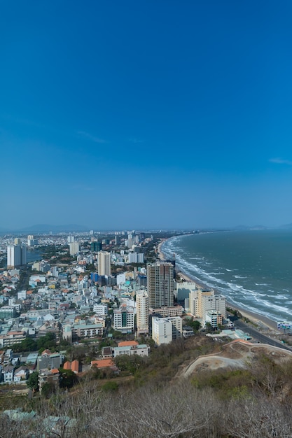 Vung Tau City in Vietnam: Stunning Views Under a Clear Blue Sky – Free Download