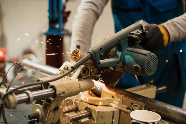 Worker Using a Circular Grinder on Metal Sparks – Free Stock Photo, Download for Free