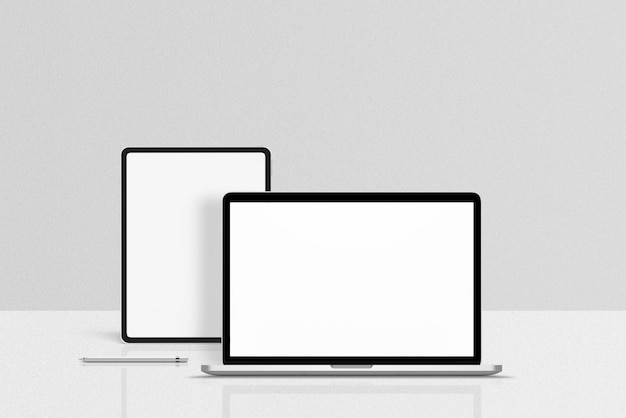 Laptops on a Table with a White Screen Displaying Text – Free Download