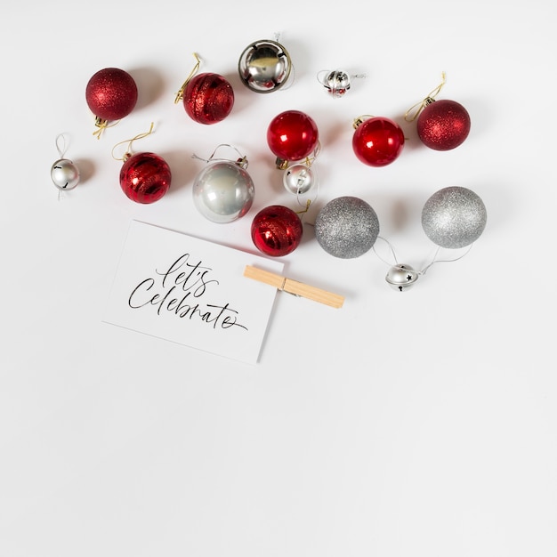 Shiny Baubles with “Let’s Celebrate” Inscription â Free Stock Photo for Download