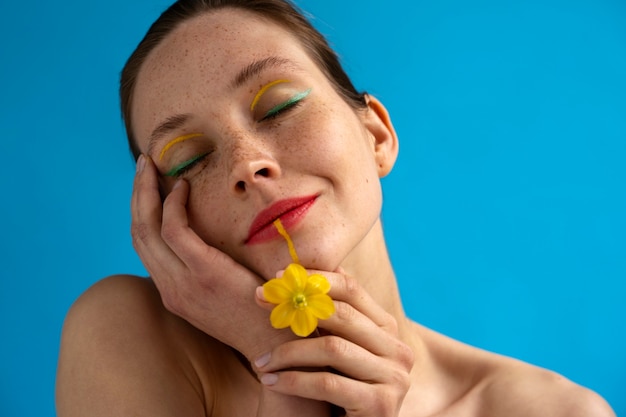 Woman Posing with Flower – Free Stock Photo for Download