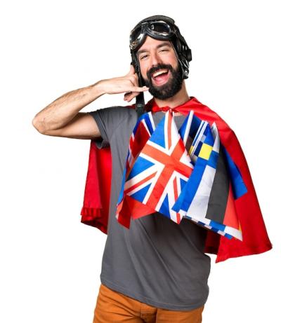 Superhero Making Phone Gesture Surrounded by Flags – Free Download