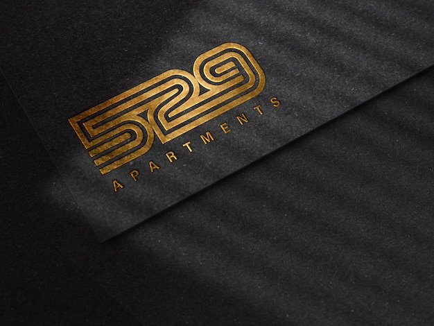 Luxury Embossed Logo Mockup on Black Paper Texture – Free Download