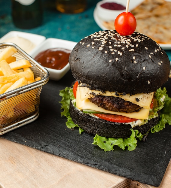 Black Burger with Double Cheese, Tomato, Lettuce, and Mayonnaise Served with Fries – Free Download