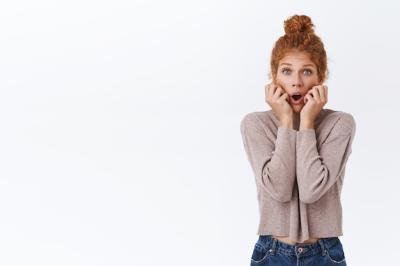 Redhead Caucasian Woman Expressing Shock and Fear – Free Download