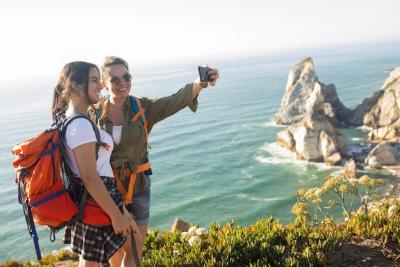 Happy Mid Adult Woman Taking Selfie with Daughter – Free Stock Photo Download