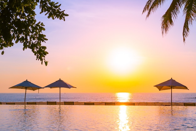 Stunning Outdoor Swimming Pool Landscape with Umbrella and Deck Chair for Relaxation – Free Download