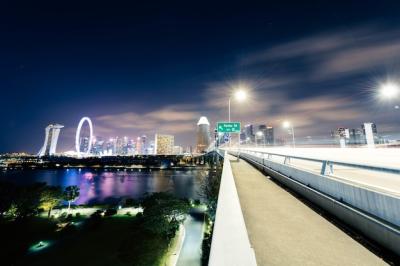 City Buildings at Night Over the Sea – Free Stock Photo for Download