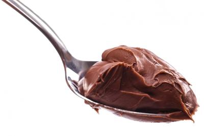 Indulge in Delicious Chocolate Cream on a Spoon – Free Download