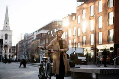 Woman Walking by Her Bike in the City – Free Stock Photo Download