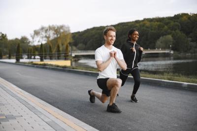 African American Fitness Model and Caucasian Man Training Outdoors – Free Stock Photo for Download