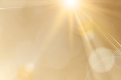 Natural Light Lens Flare on Gold Background – Sun Ray Effect | Free Download