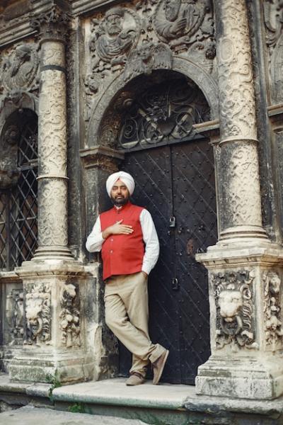 Indian Man in Traditional Turban in a Summer City – Free Download