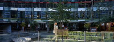 Young Business Woman in Beige Suit Walking in City Center â Free Stock Photo, Download for Free