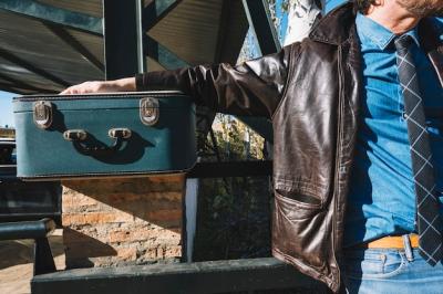 Crop Man with Suitcase at Train Station – Free Download