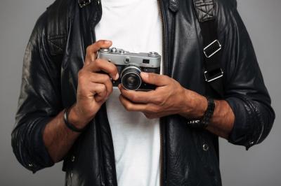 Close-Up of a Young African Male Photographer – Free Download