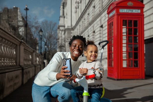 Smiling Woman and Child Taking Selfie – Free Stock Photo, Download Free