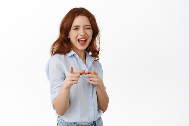 Woman Recruiting for Work, Pointing Fingers and Winking – Free Stock Photo, Download for Free