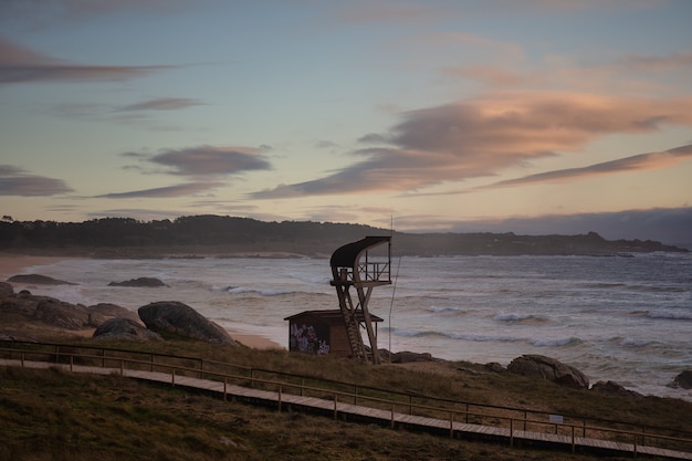 Lifeguard Tower at Sunset in Corrubedo Natural Park, Spain – Free Stock Photo