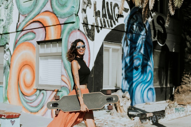 Cool Woman with a Longboard – Free Stock Photo for Download