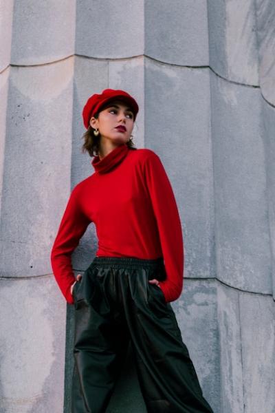 Young Woman in Red Cap Posing with Hands in Pocket – Free Download