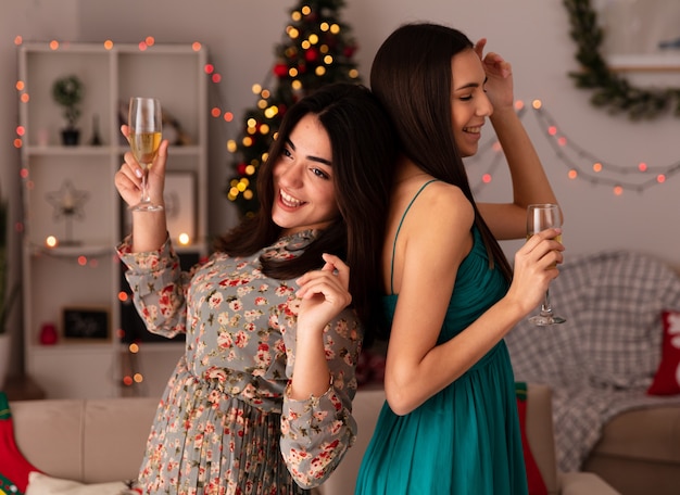 Christmas Celebration with Young Girls Enjoying Champagne – Free Stock Photo, Download for Free