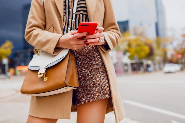 Stylish Girl in Beige Coat Chatting on Mobile Phone – Free Stock Photo, Download Free Stock Photo