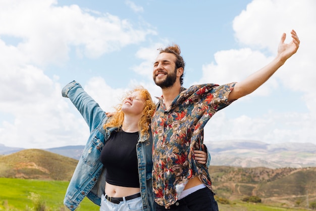 Celebrating Freedom: Man and Woman Embrace Liberation – Free Stock Photo for Download