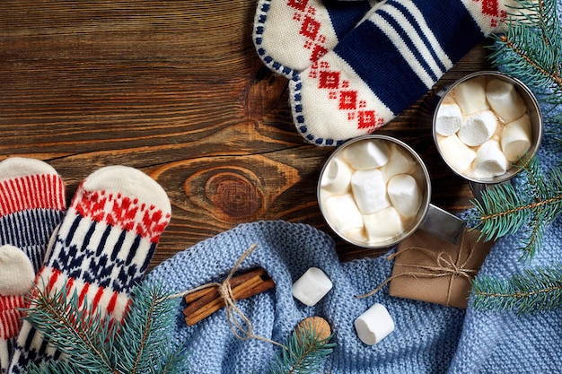 Two Cups of Hot Cocoa with Marshmallows and Christmas Decor on Rustic Wooden Background – Free Download