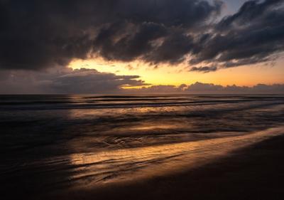 Beautiful Scenery of a Wavy Sea Under a Cloudy Sky at Sunrise – Free Stock Photo for Download