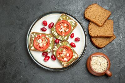 Delicious Avocado Pasta Sandwiches with Tomatoes on Grey Surface – Free Download