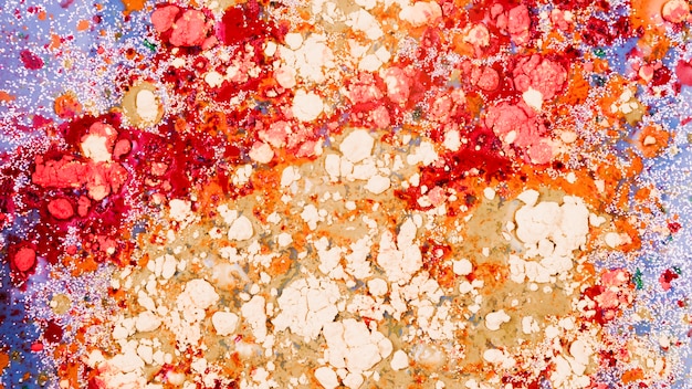 Red and Orange Crumbs on Blue Liquid – Free Download