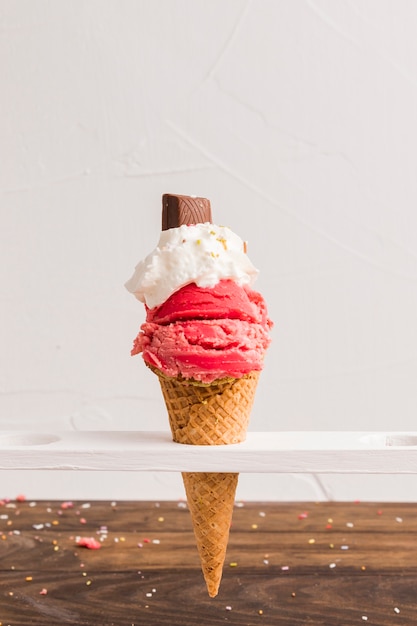 Red Frozen Ice Scoop with Whipped Cream and Chocolate Cone – Free Download