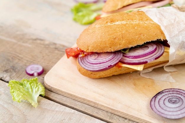 Delicious Close-Up Sandwich on Cutting Board – Free Download